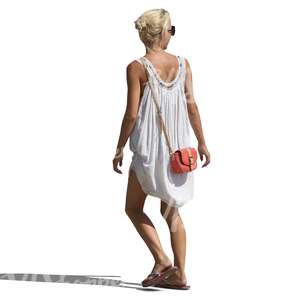 woman in a white dress walking 