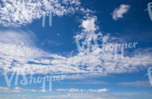 daytime sky with scattered clouds