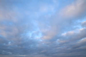 blue sky with thin stratus clouds