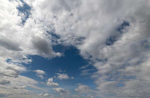 cloudy sky with one clear spot