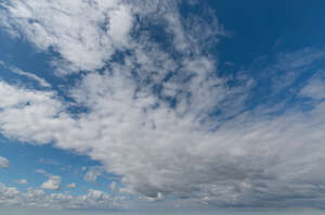 blue sky with large white clouds