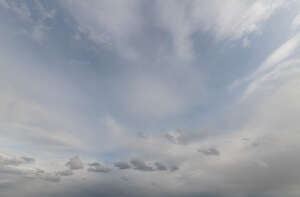 sky covered with thin layer of clouds