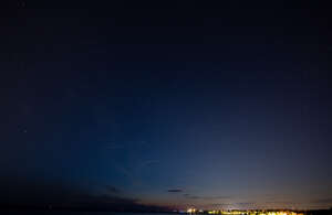 deep blue night sky with city lights