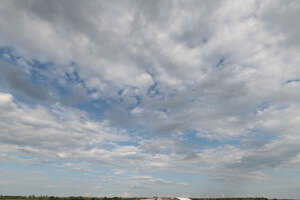 sky almost covered with white clouds