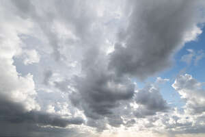 daytime sky covered with many big clouds