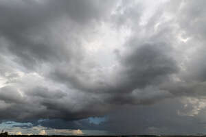 daytime sky with thunder clouds