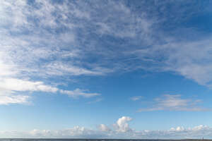 daytime sky with small regular clouds