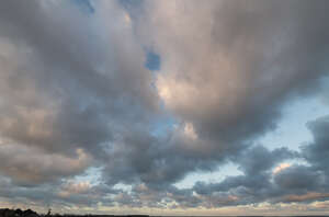 late afternoon sky with some pink clouds