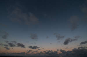 evening sky with little dark clouds