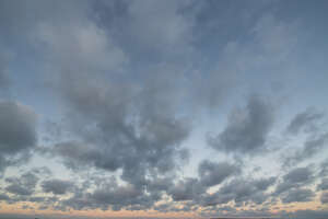 evening sky with light grey clouds