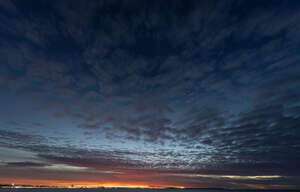 late evening sky with dark clouds and sunset