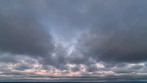 pink sunset with grey clouds