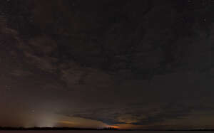 night sky with stars and light clouds