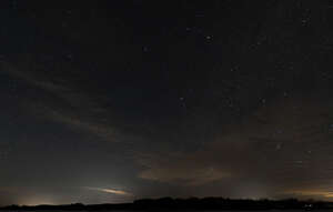 starry night sky with some clouds