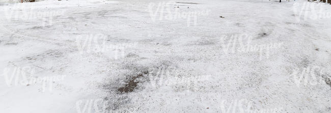 paved square covered in snow