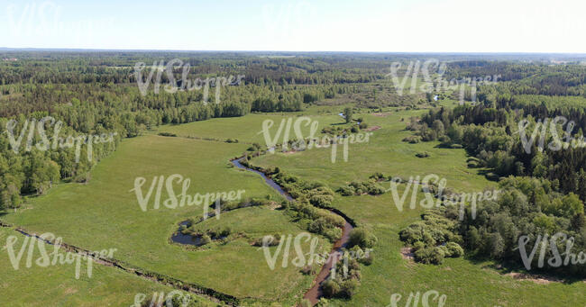 aerial photo of a small creek in countryside