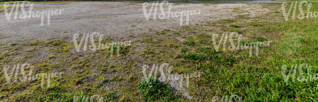 gravel and wild grass