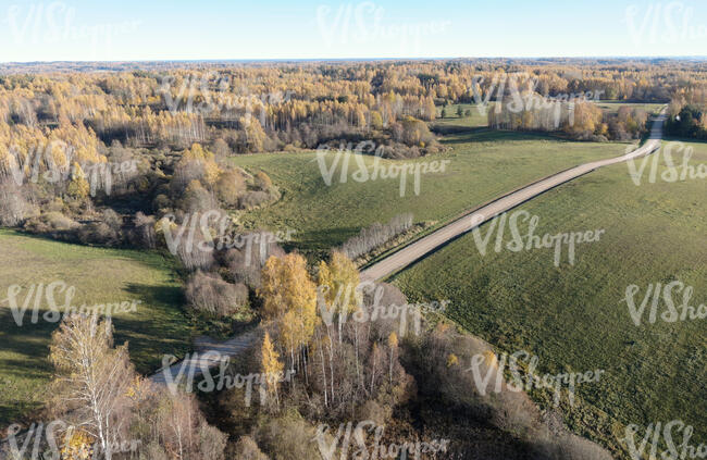 aerial view of landscape in autumn with a motorway