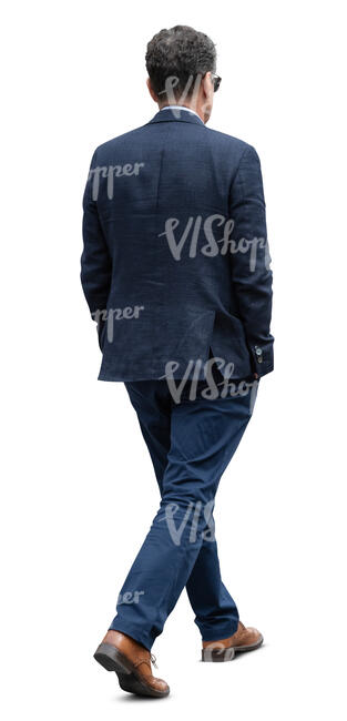 cut out man in a dark blue suit walking