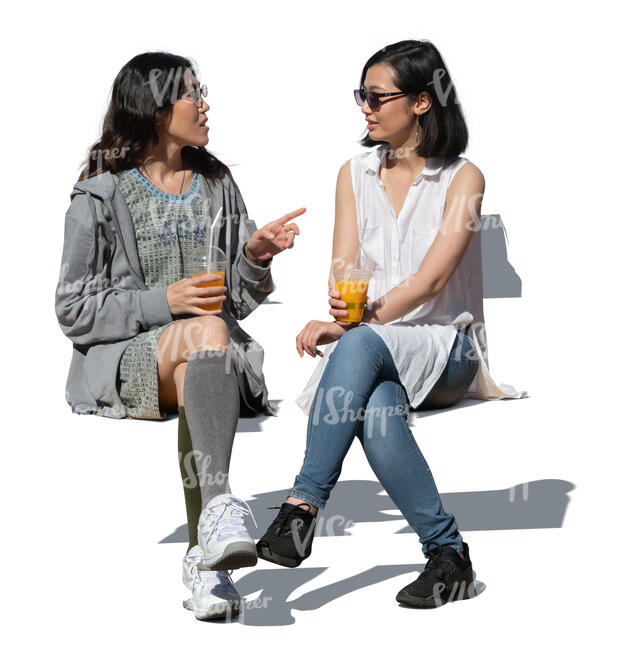 two cut out young asian women sitting and talking - VIShopper