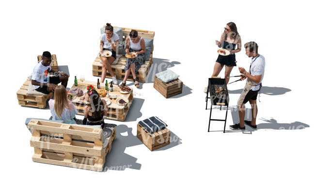 cut out group of young people having a barbeque party seen from above