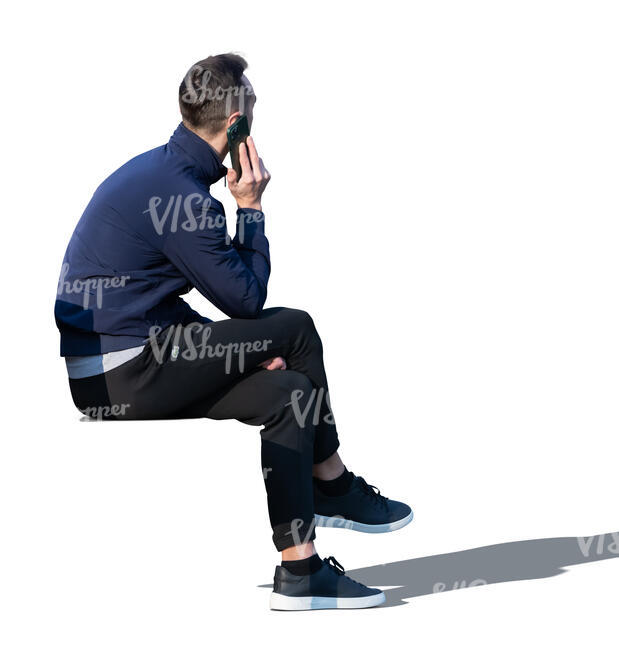 cut out man sitting and talking on a phone