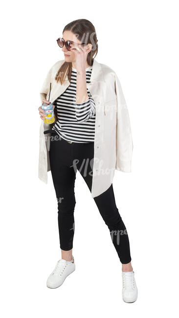 cut out woman standing and drinking soft drink seen from above