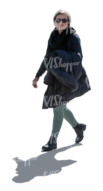 cut out backlit woman in early spring walking