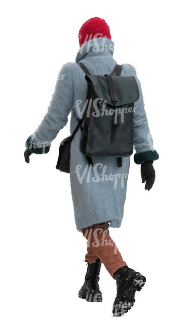 woman with a backpack walking in winter