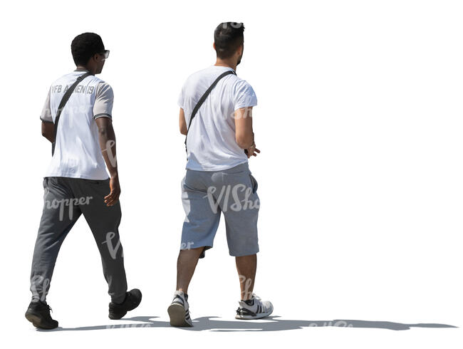 two sidelit men walking