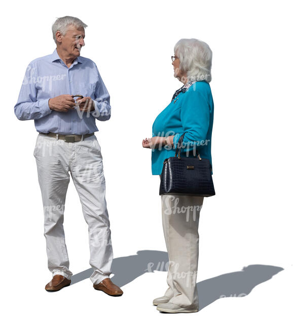 two grey haired people standing and talking