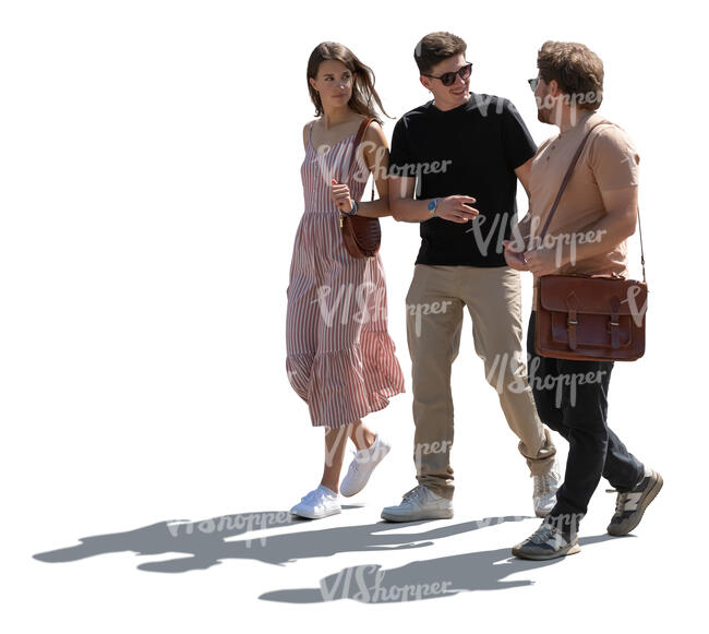 group of three people walking