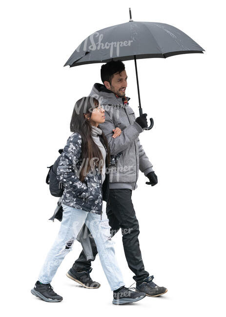 man and woman walking together under an umbrella