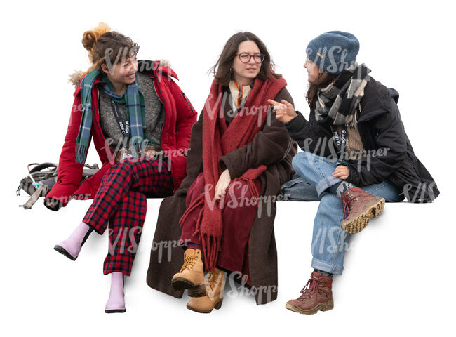 three women sitting and talking