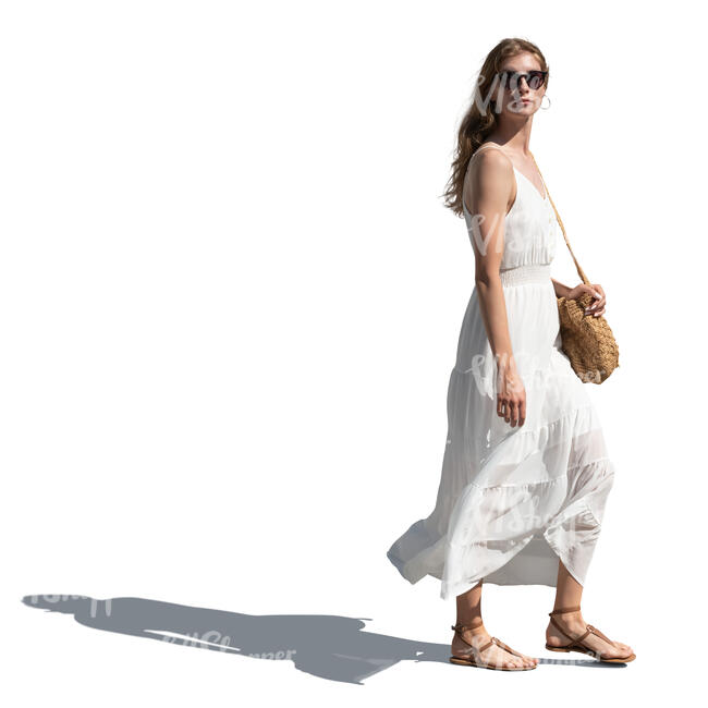 woman in a white summer dress walking