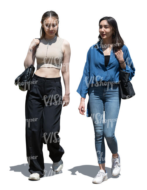 two cut out young women walking