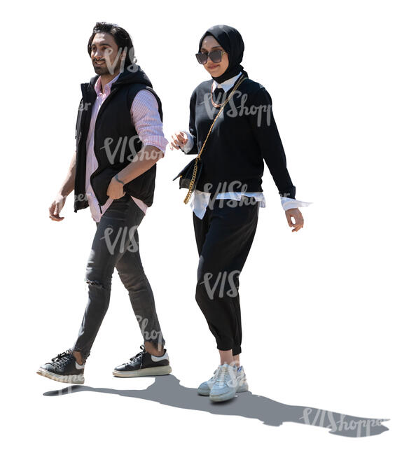 cut out backlit middle eastern man and woman walking