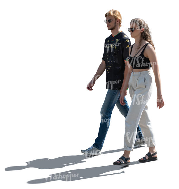 two cut out backlit people walking in summer