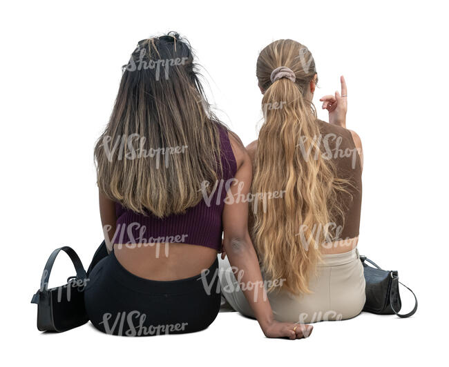 two cut out women sitting seen from back