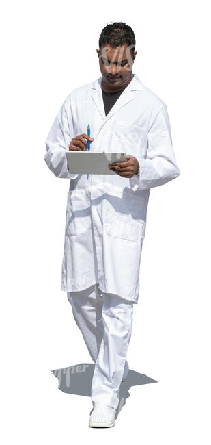 cut out indian doctor walking and holding a tablet