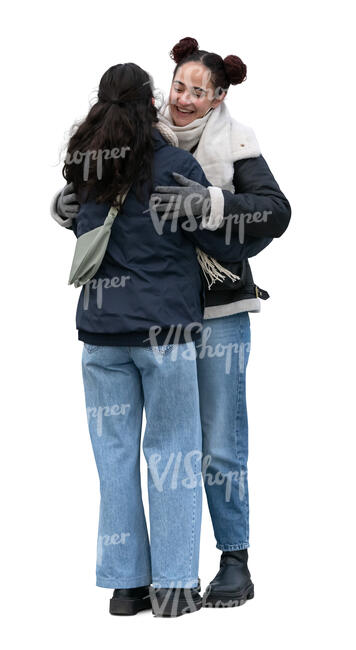 two cut out women hugging in winter