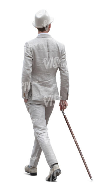 man in a white suit wearing a hat and holding a walking stick walking