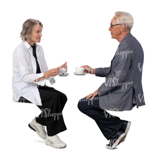 older grey haired man and woman sitting in a cafe