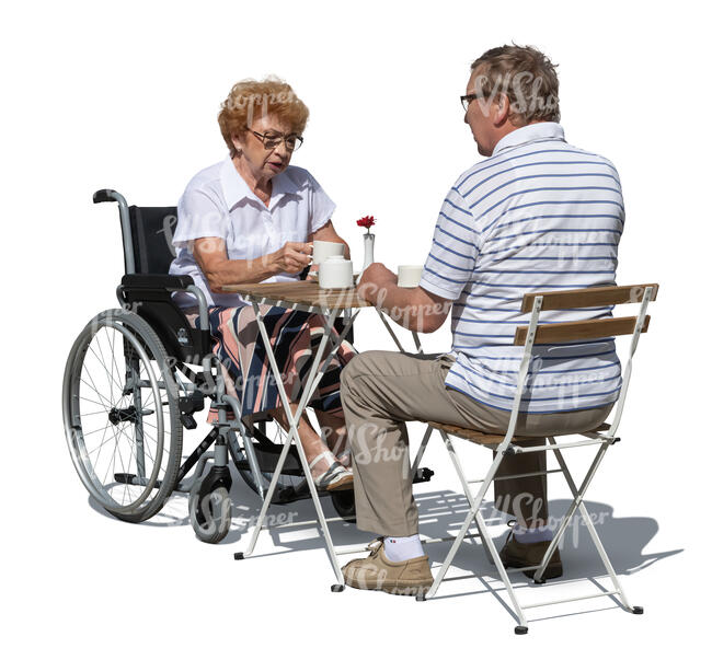 elderly couple sitting in a cafe