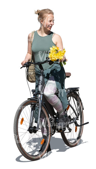 woman holding flowers and riding a bike