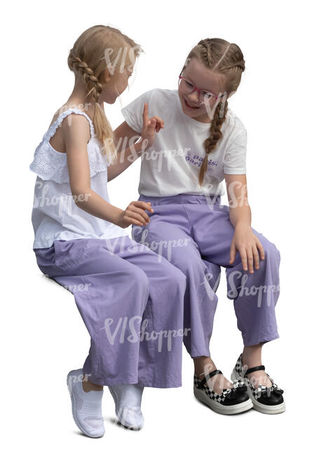 two girls sitting and talking