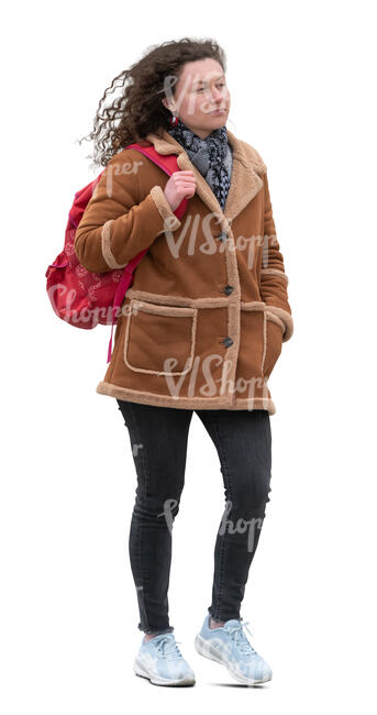 woman with a brown leather jacket walking