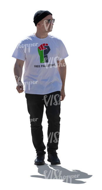 backlit man wearing a free palestine t shirt walking