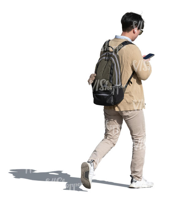 cut out asian man walking and checking his phone