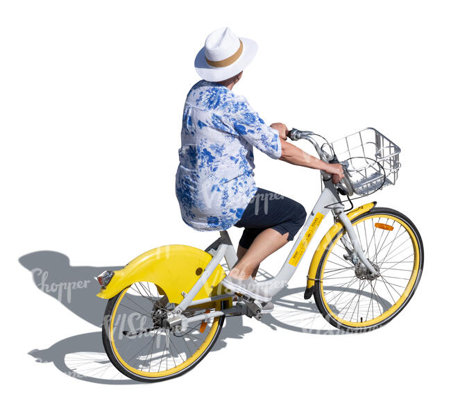 older woman with a hat riding a bike seen from above